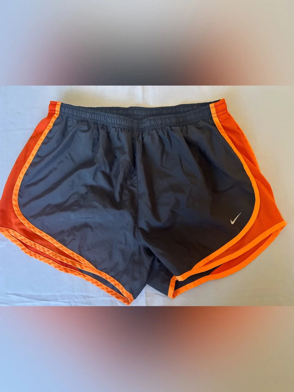 Nike Women’s Black and Orange Athletic Shorts